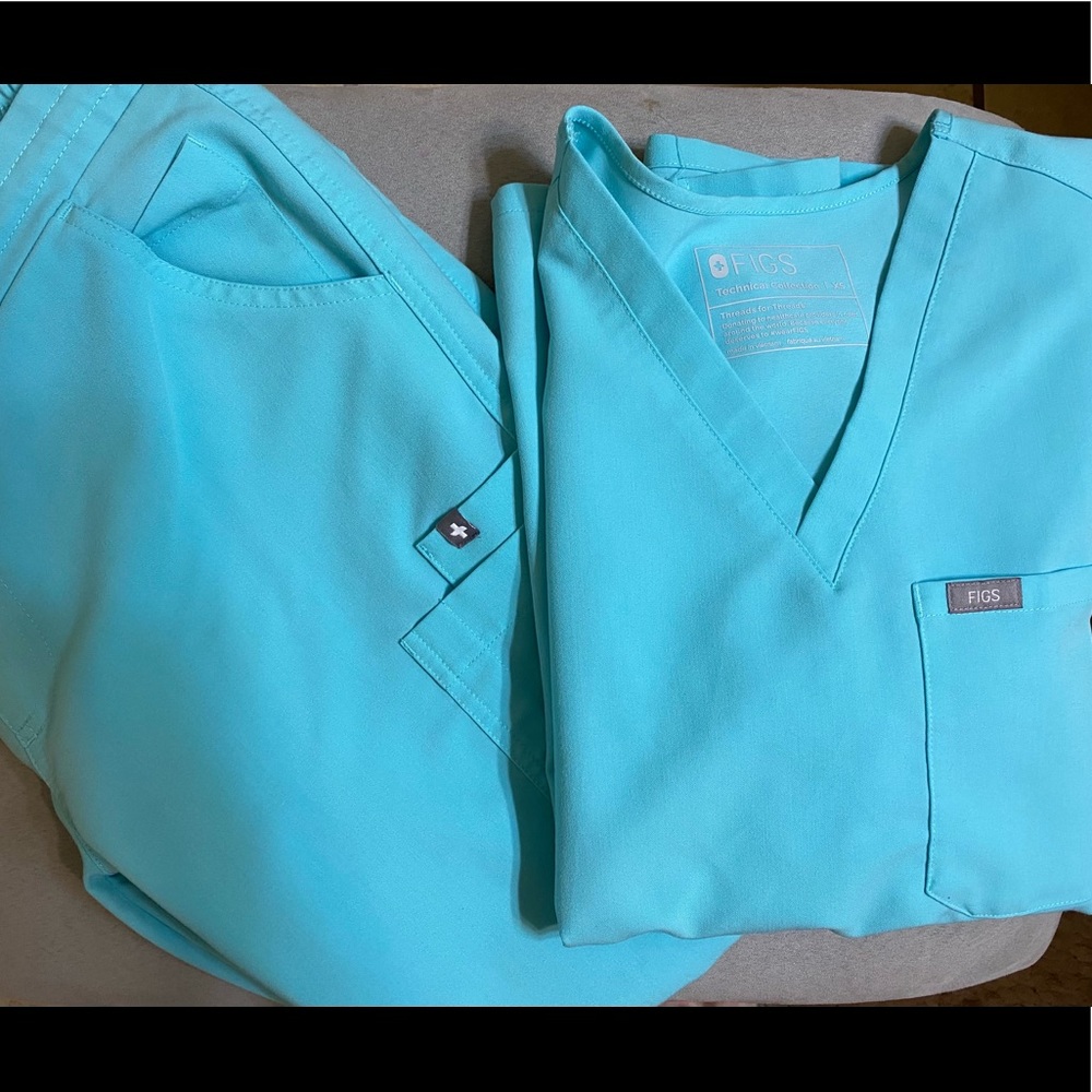 Used figs scrubs. Color Aqua. Limited.